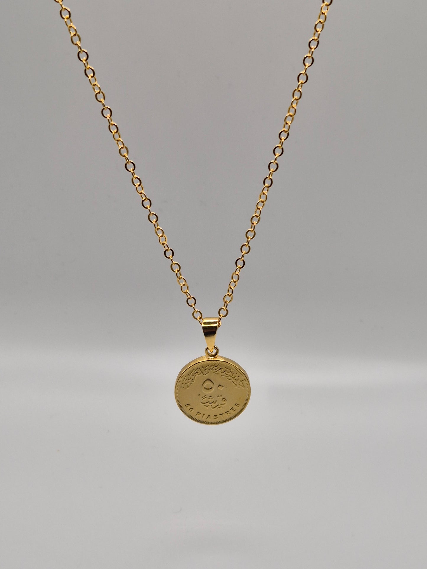 Médaille en pièce de 50cts et sa chaîne