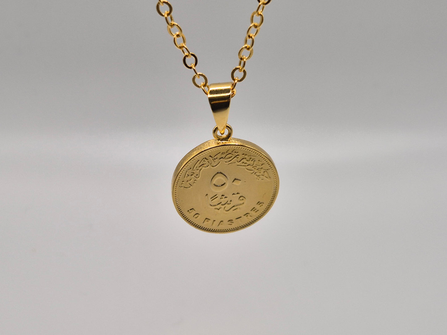 Médaille en pièce de 50cts et sa chaîne